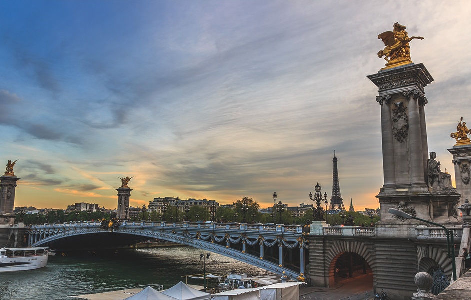 The ornate Alexandre III Bridge over the Seine River, with its gilded statues and Art Nouveau lamps. Paris Itinerary 4 days