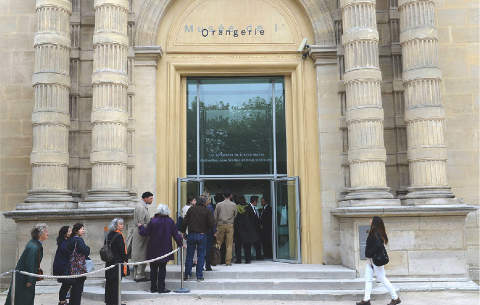 A display inside the Musée des Arts Décoratifs, showcasing elegant furniture and decorative arts.