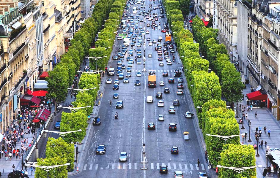 The-lively-Champs-Elysees-Avenue-with-cafes-shoppers-and-autumn-leaves